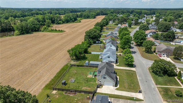 aerial view of property's location with nearby suburban area