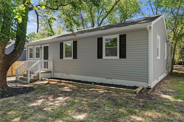 view of front of home featuring crawl space