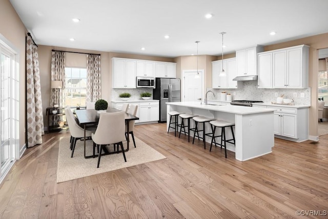 7 Abercrombie Dr, Chesterfield, VA 23838 - dining area with light wood-style floors and recessed lighting
