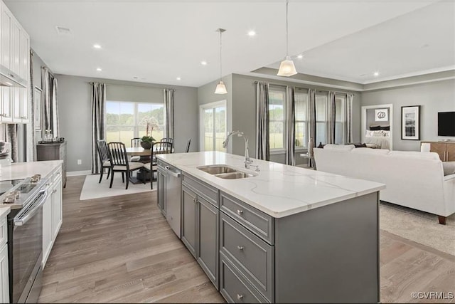 8 Abercrombie Dr, Chesterfield, VA 23838 - kitchen with a sink, stainless steel appliances, gray cabinets, light wood-type flooring, and recessed lighting