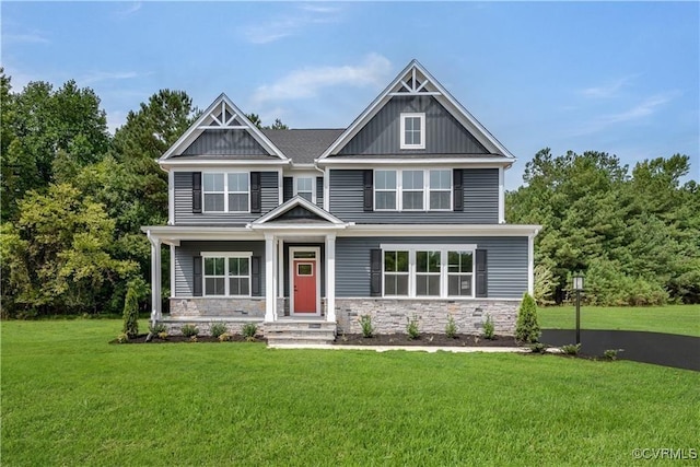 9 Abercrombie Dr, Chesterfield, VA 23838 - craftsman-style home with a front yard, stone siding, and board and batten siding