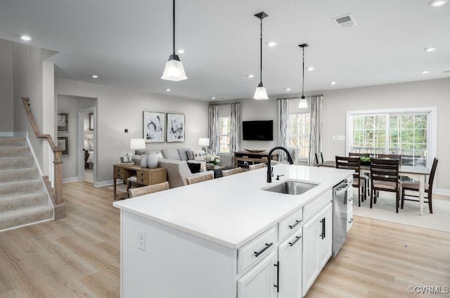 9 Abercrombie Dr, Chesterfield, VA 23838 - kitchen featuring a sink, stainless steel dishwasher, light wood-style flooring, hanging light fixtures, and recessed lighting