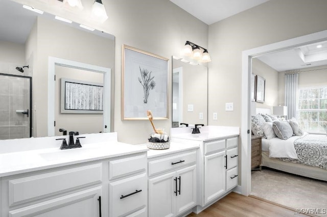9 Abercrombie Dr, Chesterfield, VA 23838 - ensuite bathroom with double vanity, wood finished floors, and tiled shower