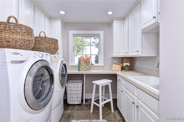 6454 Carmines Island Ln, Gloucester, VA 23072 - clothes washing area featuring washing machine and dryer, cabinet space, and recessed lighting