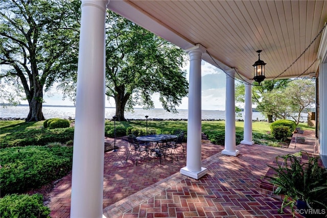 6454 Carmines Island Ln, Gloucester, VA 23072 - view of patio featuring a water view and covered porch