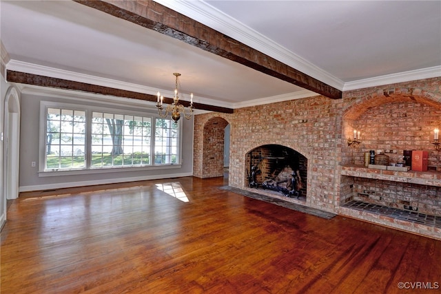 6454 Carmines Island Ln, Gloucester, VA 23072 - unfurnished living room featuring a chandelier, wood finished floors, a fireplace, baseboards, and ornamental molding