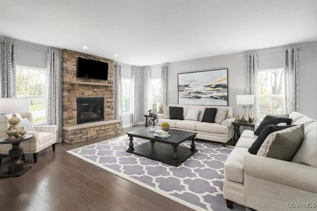 11 Abercrombie Dr, Chesterfield, VA 23838 - living room with healthy amount of natural light, wood finished floors, a stone fireplace, and recessed lighting