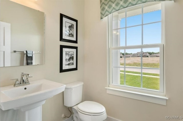 11 Abercrombie Dr, Chesterfield, VA 23838 - bathroom with toilet, baseboards, wallpapered walls, and a sink