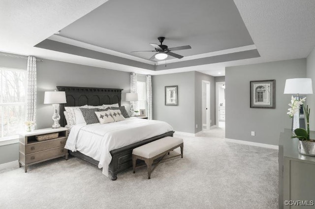 11 Abercrombie Dr, Chesterfield, VA 23838 - bedroom featuring a raised ceiling, baseboards, light colored carpet, and ceiling fan