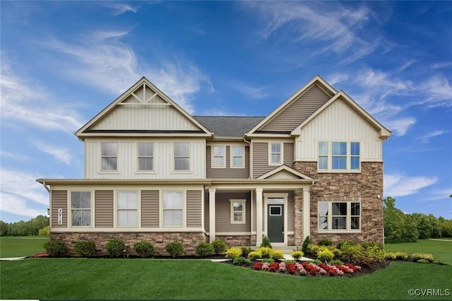 13 Abercrombie Dr, Chesterfield, VA 23838 - craftsman-style house with stone siding, board and batten siding, and a front lawn