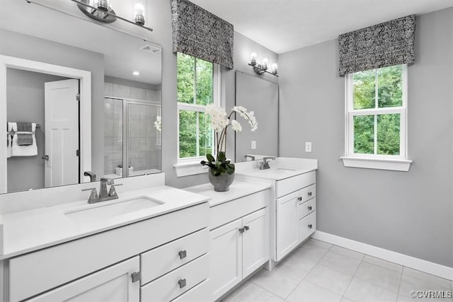 13 Abercrombie Dr, Chesterfield, VA 23838 - full bath with a shower stall, vanity, plenty of natural light, and baseboards