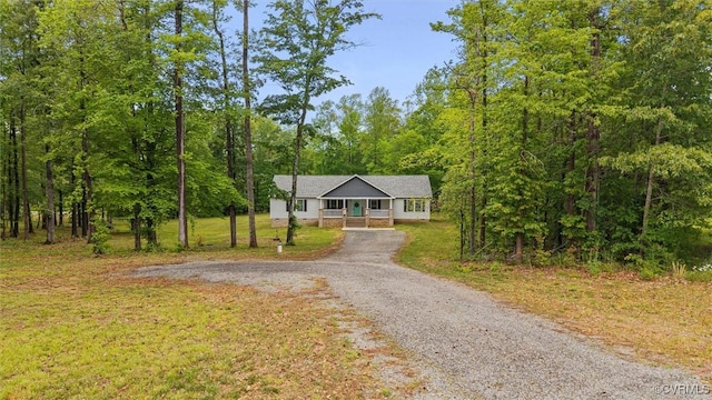 7570 Mount Zion Rd, Jetersville, VA 23083 - bungalow-style house featuring a porch, a front lawn, asphalt driveway, and a view of trees