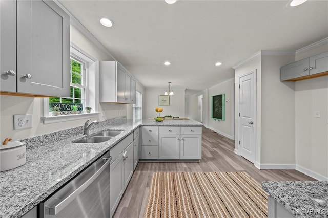 7570 Mount Zion Rd, Jetersville, VA 23083 - kitchen with a sink, dishwasher, a peninsula, ornamental molding, and light wood-style floors