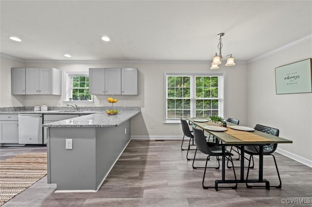 7570 Mount Zion Rd, Jetersville, VA 23083 - kitchen with ornamental molding, a peninsula, a sink, stainless steel dishwasher, and light stone countertops