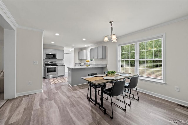 7570 Mount Zion Rd, Jetersville, VA 23083 - dining area featuring crown molding, baseboards, light wood-style floors, and recessed lighting