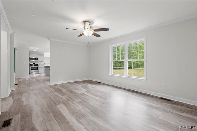 7570 Mount Zion Rd, Jetersville, VA 23083 - unfurnished living room with ornamental molding, a ceiling fan, light wood-style flooring, and baseboards