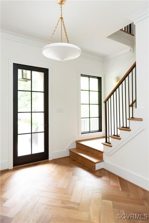 2005 Southcliff Rd, Richmond, VA 23225 - entryway with stairway, crown molding, and baseboards