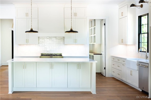 2005 Southcliff Rd, Richmond, VA 23225 - kitchen with a sink, dishwasher, light countertops, decorative backsplash, and light wood-style flooring