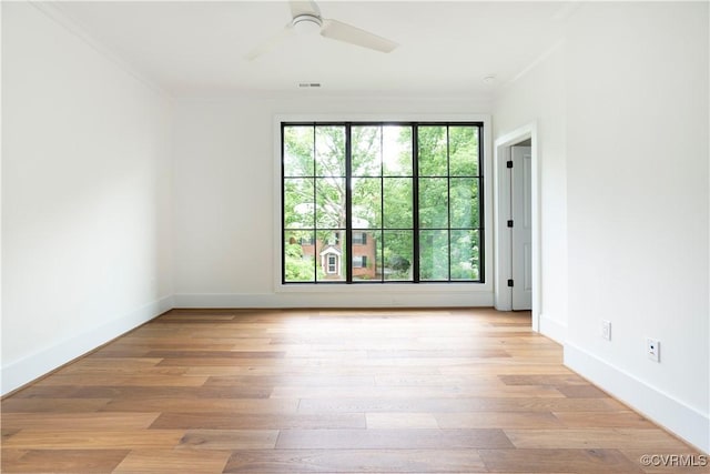 2005 Southcliff Rd, Richmond, VA 23225 - empty room with a ceiling fan, light wood-style floors, baseboards, and crown molding