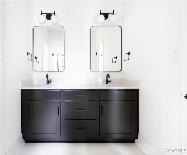 2005 Southcliff Rd, Richmond, VA 23225 - bathroom with double vanity and baseboards