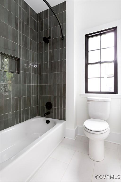 2005 Southcliff Rd, Richmond, VA 23225 - bathroom featuring tile patterned flooring, toilet, shower / washtub combination, and baseboards