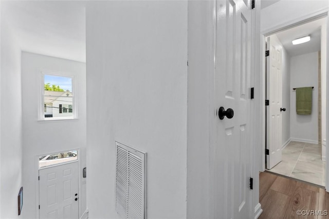 1725 Porter St, Richmond, VA 23224 - hallway with marble finish floors and baseboards
