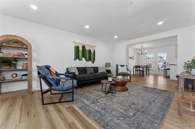 1725 Porter St, Richmond, VA 23224 - living room featuring light wood finished floors, a chandelier, and recessed lighting