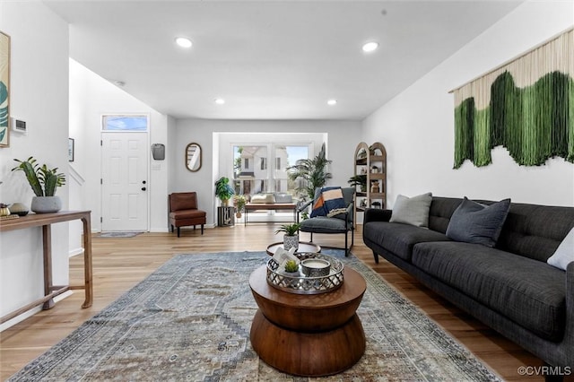 1725 Porter St, Richmond, VA 23224 - living room with light wood-type flooring, recessed lighting, and baseboards