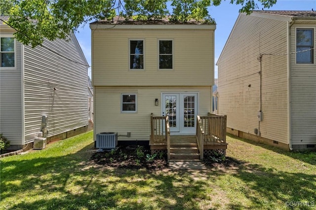 1725 Porter St, Richmond, VA 23224 - back of house featuring a yard, central AC, a wooden deck, and french doors