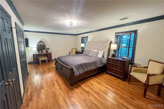 4709 Perdue St, Chester, VA 23831 - bedroom with crown molding, light wood-type flooring, multiple windows, and a desk