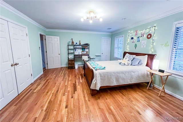 4709 Perdue St, Chester, VA 23831 - bedroom with light wood-style flooring, baseboards, crown molding, and a chandelier