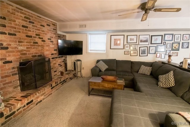 4709 Perdue St, Chester, VA 23831 - carpeted living area featuring ceiling fan and a fireplace