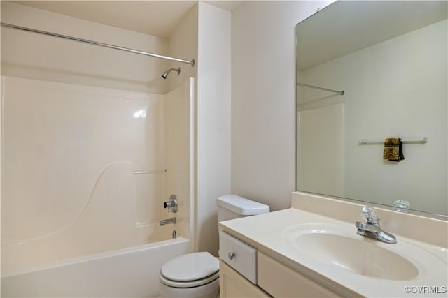 bathroom featuring toilet, shower / bathtub combination, and vanity