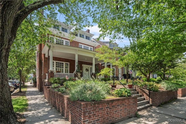 3201 Kensington Ave, Richmond, VA 23221 - view of front of house featuring brick siding and covered porch