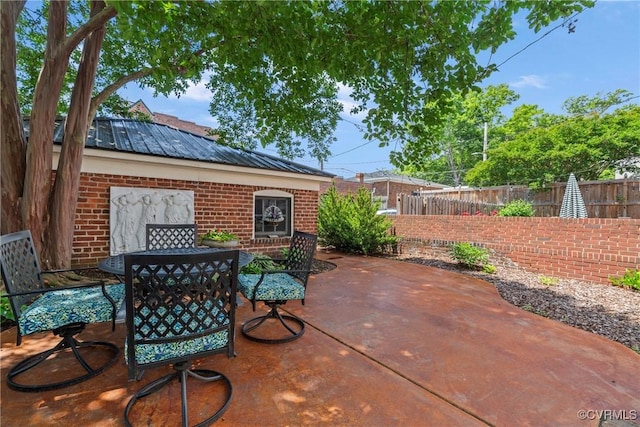 3201 Kensington Ave, Richmond, VA 23221 - view of patio / terrace featuring outdoor dining area and a fenced backyard