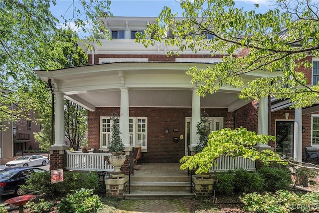 3201 Kensington Ave, Richmond, VA 23221 - view of front of property featuring brick siding and a porch