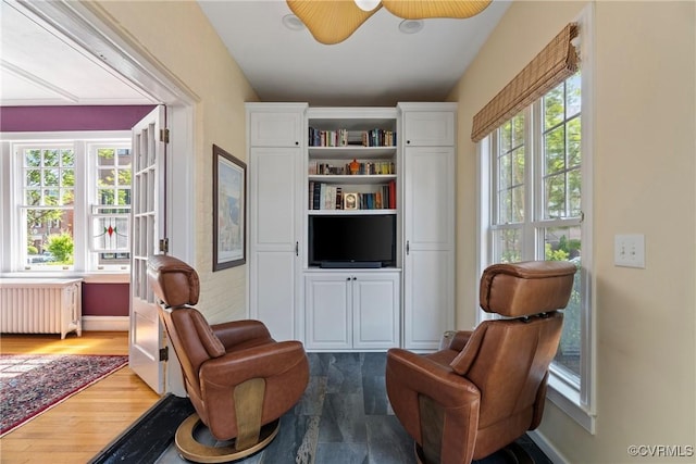 3201 Kensington Ave, Richmond, VA 23221 - sitting room with radiator heating unit and a ceiling fan