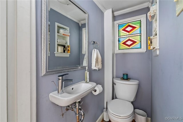 3201 Kensington Ave, Richmond, VA 23221 - half bath with toilet, crown molding, and a sink