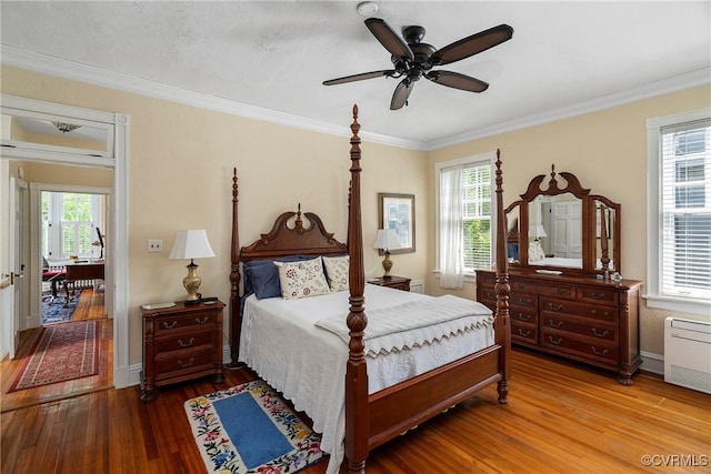 3201 Kensington Ave, Richmond, VA 23221 - bedroom with wood finished floors, multiple windows, ornamental molding, and ceiling fan