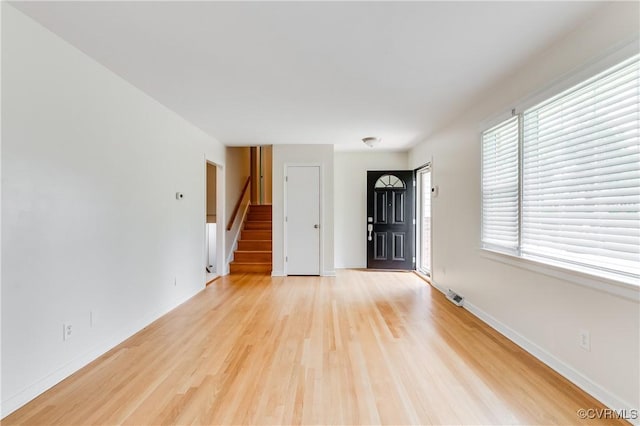 2206 Milbank Rd, Glen Allen, VA 23229 - spare room with light wood finished floors, stairway, plenty of natural light, and baseboards