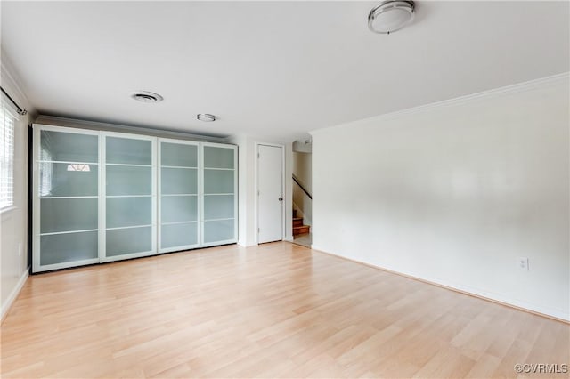 2206 Milbank Rd, Glen Allen, VA 23229 - spare room with wood finished floors, stairway, crown molding, and baseboards