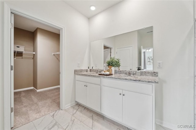 7007 Sanguine Mews, Chesterfield, VA 23234 - full bath featuring a walk in closet, double vanity, baseboards, and marble finish floors