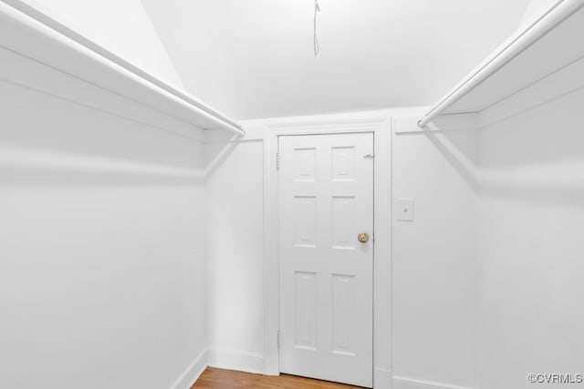 spacious closet featuring light wood-style floors