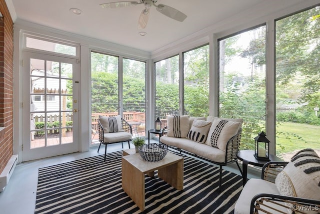 sunroom / solarium with an outdoor living space, ceiling fan, and a baseboard heating unit