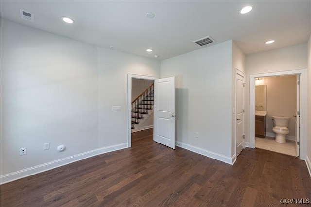 3325 Haydenpark Ln, Henrico, VA 23233 - unfurnished room with dark wood-type flooring, recessed lighting, and stairway