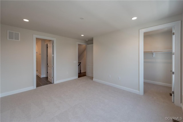 3325 Haydenpark Ln, Henrico, VA 23233 - unfurnished bedroom with carpet flooring, recessed lighting, a walk in closet, a closet, and ensuite bath