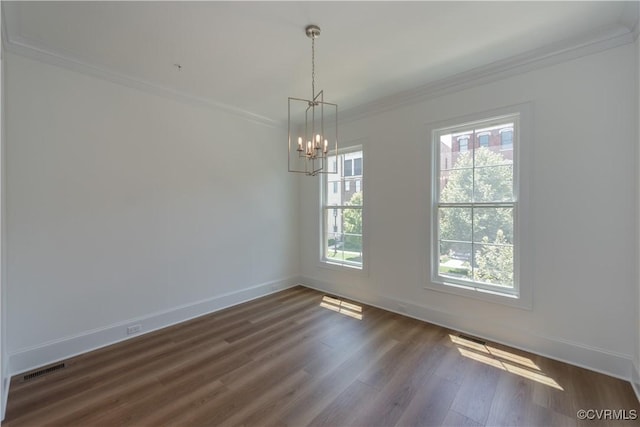 3327 Haydenpark Ln, Henrico, VA 23233 - empty room featuring ornamental molding, dark wood-type flooring, and a chandelier