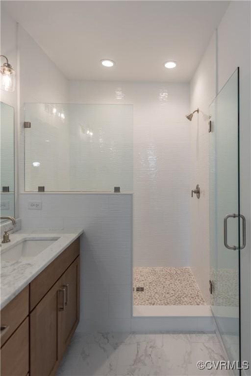 3327 Haydenpark Ln, Henrico, VA 23233 - bathroom featuring a shower stall, vanity, marble finish flooring, and recessed lighting
