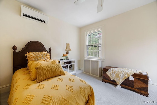 carpeted bedroom with a wall mounted air conditioner, radiator heating unit, baseboards, and a ceiling fan