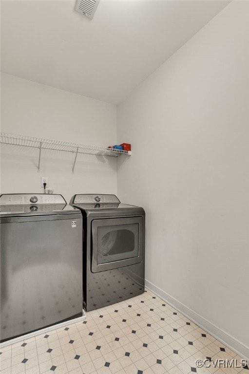 12027 Beaver Spring Ct, Midlothian, VA 23112 - washroom featuring washer and clothes dryer and tile patterned floors